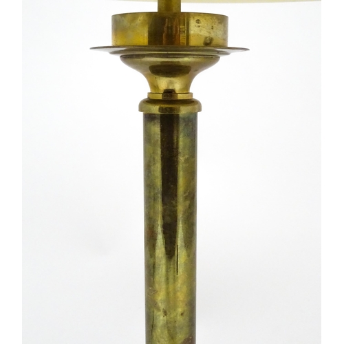 1417 - A brass table lamp of column form on squared base. Approx. 18