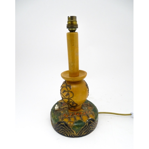 1418 - A 20thC turned wooden table lamp with painted detail depicting Mount Fuji, pagoda style buildings, e... 