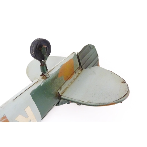 948 - A 20thC scratch built tin plate scale model of a spitfire. Approx. 18