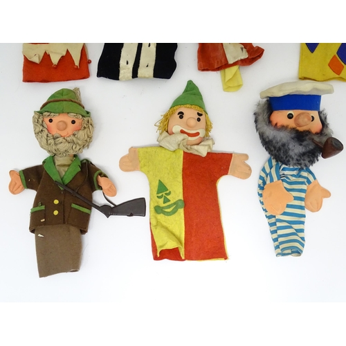 955 - Toys: Seven vintage assorted hand / glove puppets to include king, clown, jester, fisherman, etc. La... 