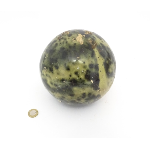 1105 - Natural History / Geology Interest: A large polished hardstone specimen sphere, possibly green pyrit... 