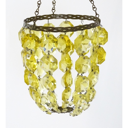 1407 - Three assorted pendant bag light shades with lustre drops. Together with a yellow amber glass shade ... 