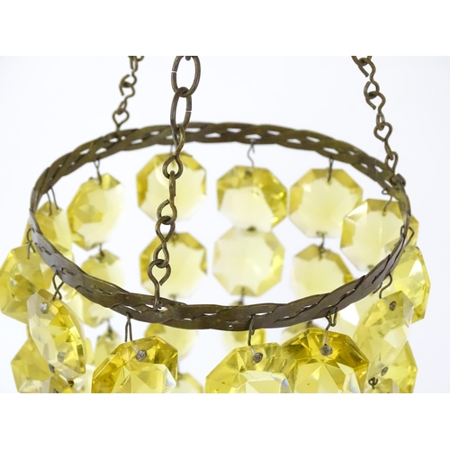 1407 - Three assorted pendant bag light shades with lustre drops. Together with a yellow amber glass shade ... 