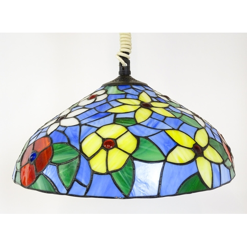 1408 - A Tiffany style light shade with floral stained glass style detail and rise and fall style light fit... 