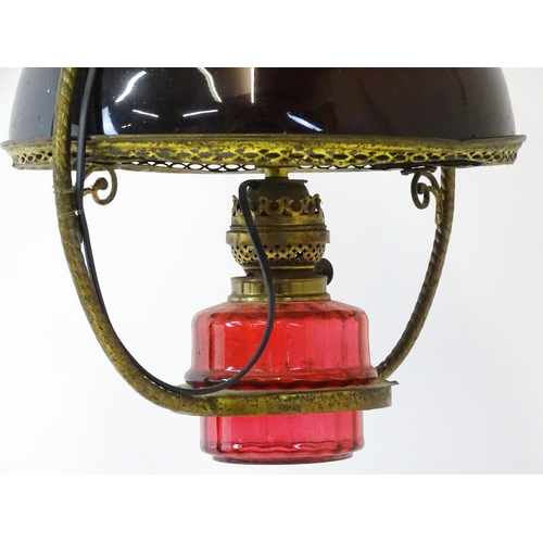 1409 - A Hinks & Son hanging pendant oil lamp. Together with another. Largest approx. 18