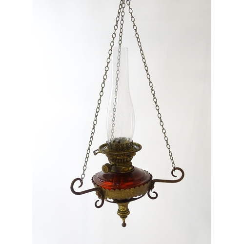 1409 - A Hinks & Son hanging pendant oil lamp. Together with another. Largest approx. 18