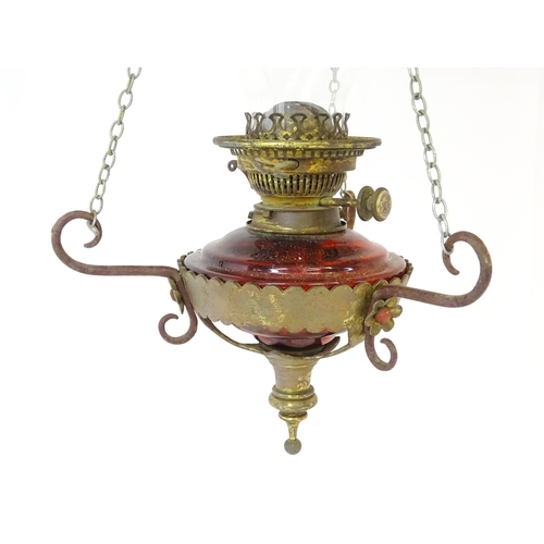 1409 - A Hinks & Son hanging pendant oil lamp. Together with another. Largest approx. 18