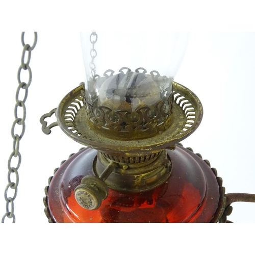 1409 - A Hinks & Son hanging pendant oil lamp. Together with another. Largest approx. 18