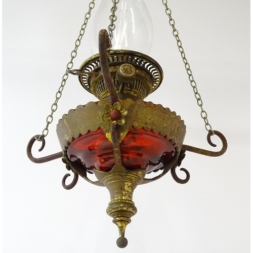 1409 - A Hinks & Son hanging pendant oil lamp. Together with another. Largest approx. 18