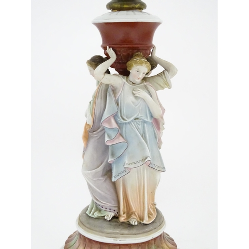 1411 - A table lamp formed from an oil lamp with ceramic figural base. Approx. 22