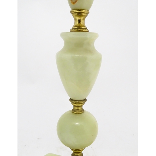 1414 - A 20thC table lamp with onyx style turned base. Approx. 18