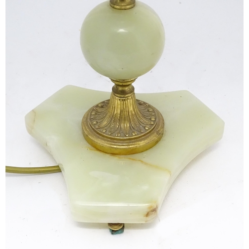 1414 - A 20thC table lamp with onyx style turned base. Approx. 18