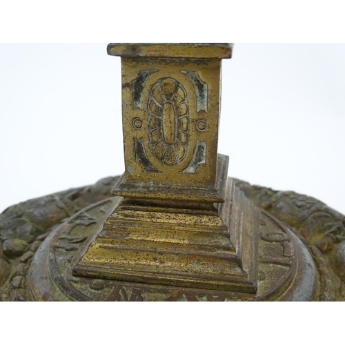 1423 - A pair of 19thC Continental cast brass tall candlesticks with figural, lions mask and foliate detail... 