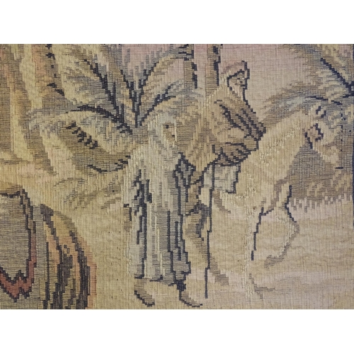 2163 - A 20thC Continental tapestry depicting a Middle Eastern market scene with figures and a street vendo... 