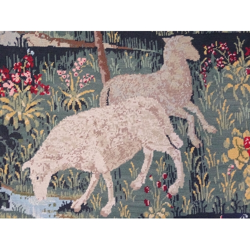 2164 - Two 20thC Continental tapestries one depicting sheep grazing with town beyond, the other depicting a... 