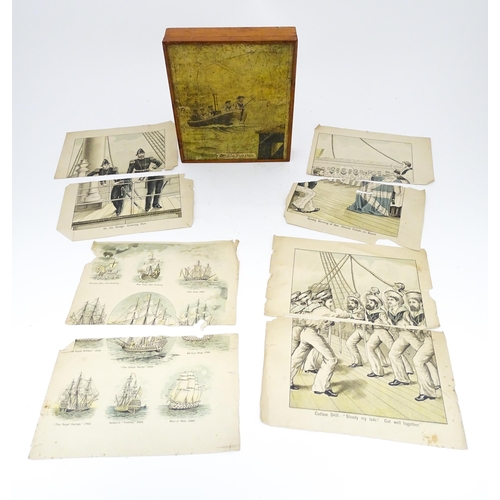 946 - A vintage wooden jigsaw puzzle tilted Double Puzzles, the double sided pieces depicting marine / mar... 