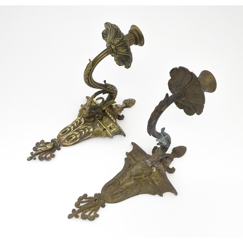 1421A - Two cast wall sconces with urn and rams head detail. Approx. 12