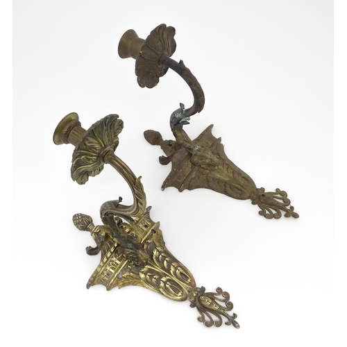 1421A - Two cast wall sconces with urn and rams head detail. Approx. 12