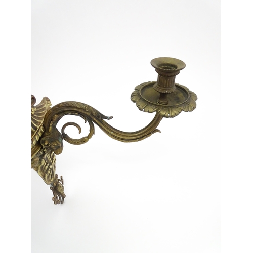 1421A - Two cast wall sconces with urn and rams head detail. Approx. 12