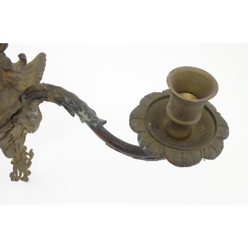 1421A - Two cast wall sconces with urn and rams head detail. Approx. 12