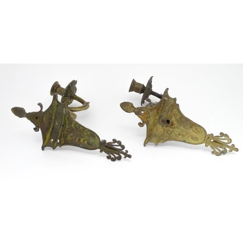 1421A - Two cast wall sconces with urn and rams head detail. Approx. 12