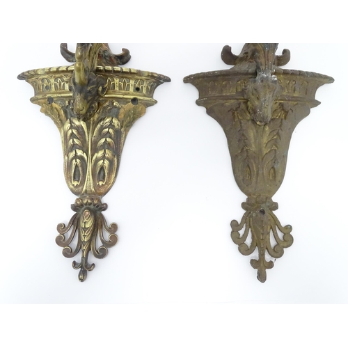 1421A - Two cast wall sconces with urn and rams head detail. Approx. 12