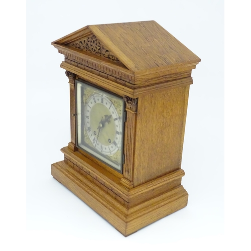 1434 - A 19thC German oak cased mantle clock by Winterhalder & Hofmeier, having a silvered chapter ring, th... 