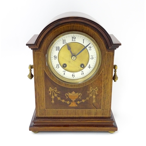 1440 - A late 19thC / early 20thC German mahogany cased mantel clock by Philipp Haas & Sohne. The case with... 