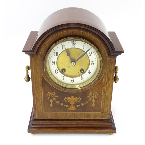 1440 - A late 19thC / early 20thC German mahogany cased mantel clock by Philipp Haas & Sohne. The case with... 