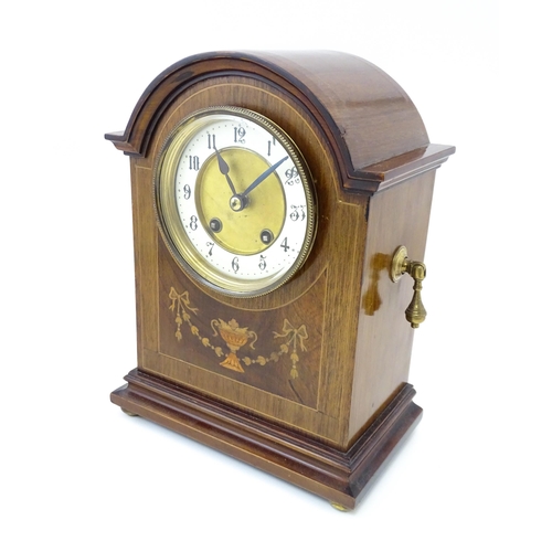 1440 - A late 19thC / early 20thC German mahogany cased mantel clock by Philipp Haas & Sohne. The case with... 