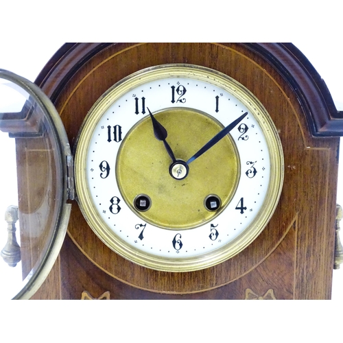 1440 - A late 19thC / early 20thC German mahogany cased mantel clock by Philipp Haas & Sohne. The case with... 