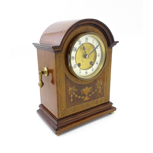 1440 - A late 19thC / early 20thC German mahogany cased mantel clock by Philipp Haas & Sohne. The case with... 