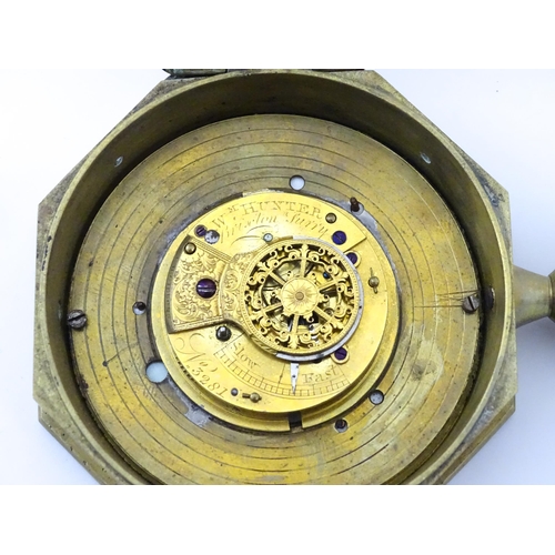 1441 - A brass cased hanging sedan style clock of octagonal form, with Roman hours and Arabic seconds. Appr... 