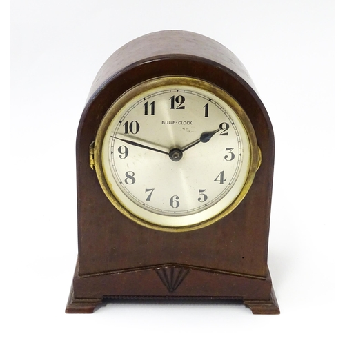 1444 - Bulle - Clock : A French Art Deco mahogany cased electric mantel clock by Bulle. model XC.  Approx. ... 