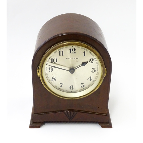 1444 - Bulle - Clock : A French Art Deco mahogany cased electric mantel clock by Bulle. model XC.  Approx. ... 