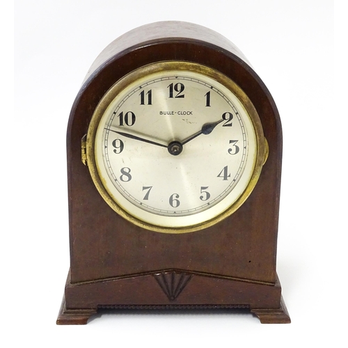 1444 - Bulle - Clock : A French Art Deco mahogany cased electric mantel clock by Bulle. model XC.  Approx. ... 