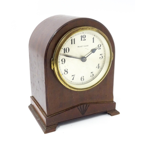 1444 - Bulle - Clock : A French Art Deco mahogany cased electric mantel clock by Bulle. model XC.  Approx. ... 