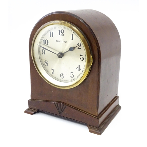 1444 - Bulle - Clock : A French Art Deco mahogany cased electric mantel clock by Bulle. model XC.  Approx. ... 