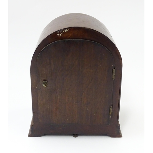 1444 - Bulle - Clock : A French Art Deco mahogany cased electric mantel clock by Bulle. model XC.  Approx. ... 