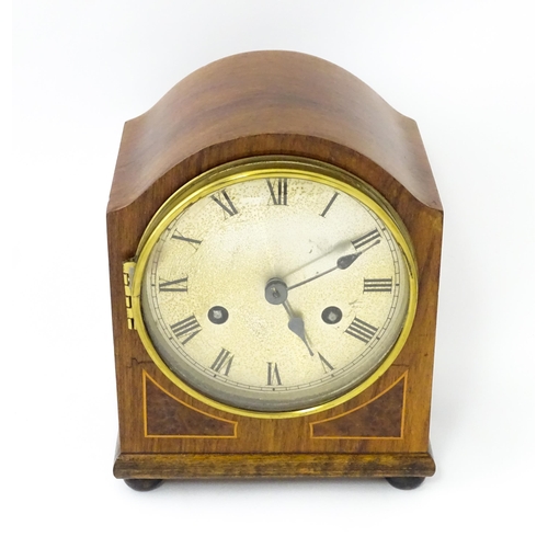 1446 - An early 20thC German walnut cased mantle clock with burr walnut veneered detail and satinwood strin... 