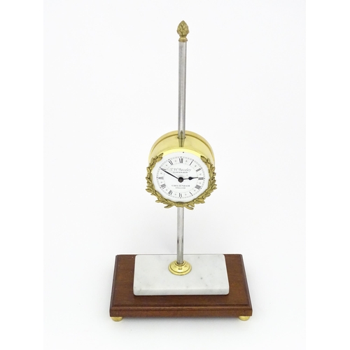 1448 - A 20thC gravity rack clock, the dial signed T. W. Bazeley, Clockmaker, Cheltenham, England within a ... 