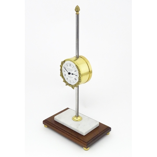 1448 - A 20thC gravity rack clock, the dial signed T. W. Bazeley, Clockmaker, Cheltenham, England within a ... 