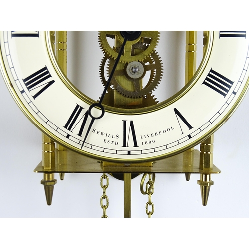 1449 - A late 20thC Sewills of Liverpool brass cased skeleton lantern wall clock, circular dial with chapte... 