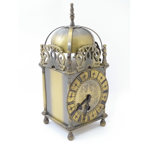 1451 - Smiths - Great Britain : A 20thC brass lantern clock by Smiths with engraved dial and Roman numeral ... 