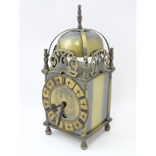 1451 - Smiths - Great Britain : A 20thC brass lantern clock by Smiths with engraved dial and Roman numeral ... 