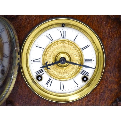 1453 - A Late 19thC / Early 20thC American oak cased mantle clock by the Ansonia Clock Company - New York, ... 