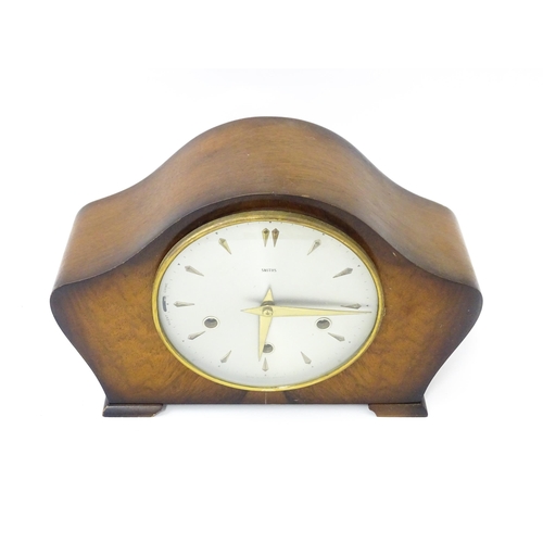 1458 - A 20thC smiths walnut cased mantle clock with chiming movement.  Approx. 8