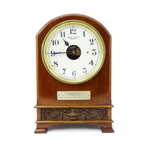 1460 - Bulle - Clock : A French  mahogany cased electric mantel clock by Bulle. Model BC. The case decorate... 