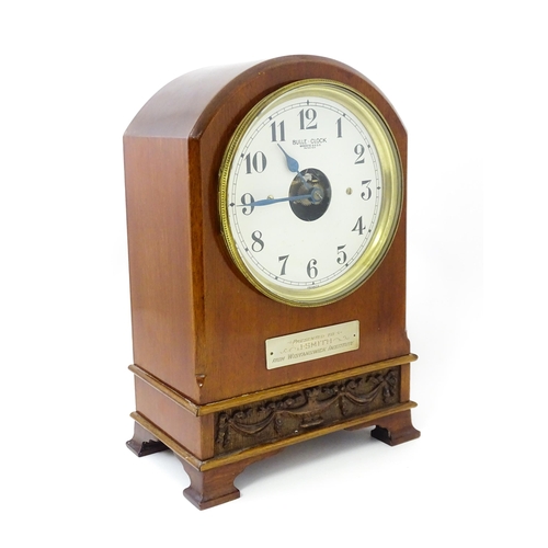 1460 - Bulle - Clock : A French  mahogany cased electric mantel clock by Bulle. Model BC. The case decorate... 