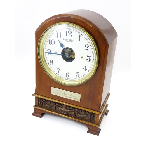 1460 - Bulle - Clock : A French  mahogany cased electric mantel clock by Bulle. Model BC. The case decorate... 